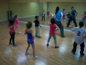 learning dance in mirror wall studio