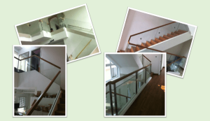 Glass panel railing with wooden top