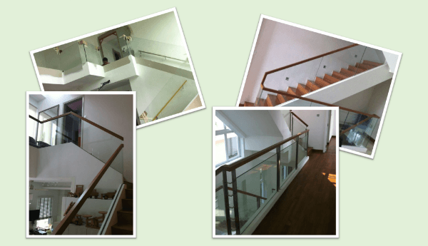 Glass panel railing with wooden top