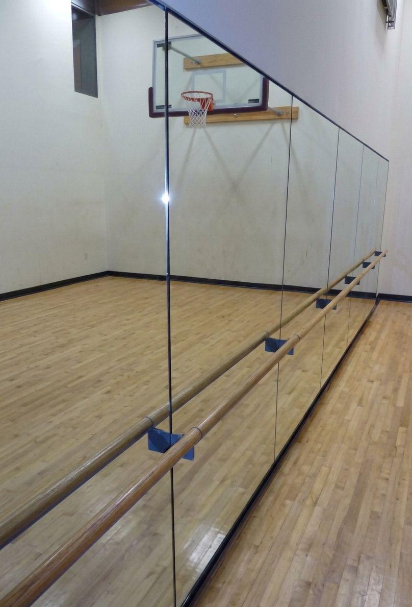 Glass wall with handrail inside dance studio