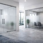 Office space with frosted glass meeting room partitions
