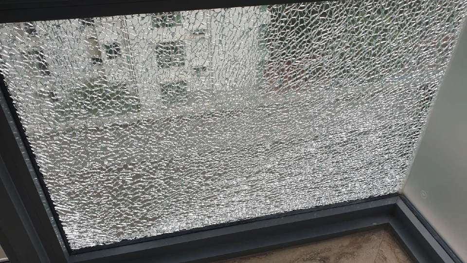 Tempered glass shattered in Condo bedroom