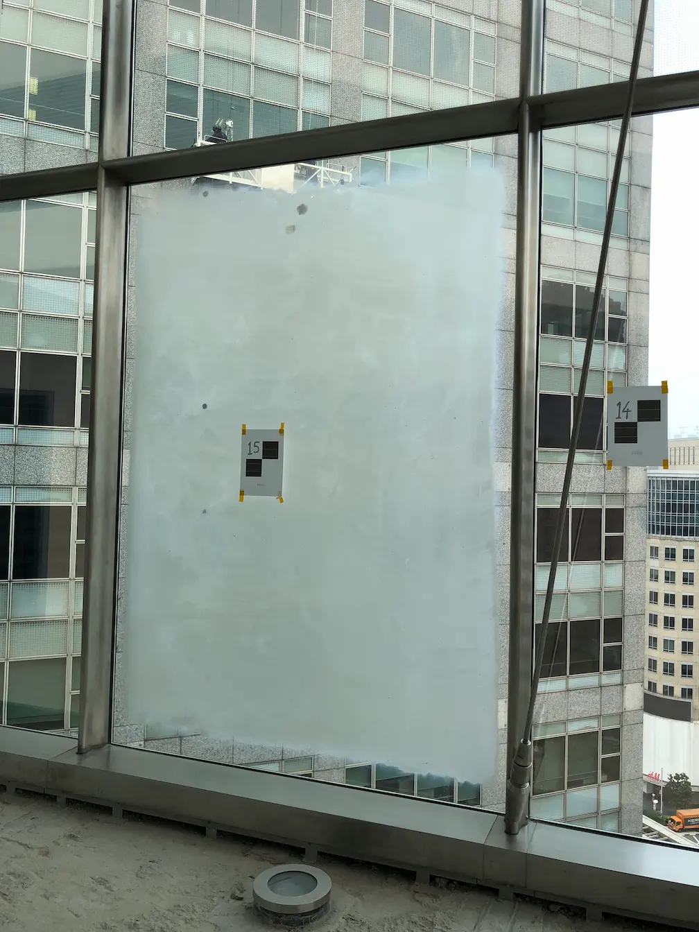 Partially frosted glass window in a high-rise building